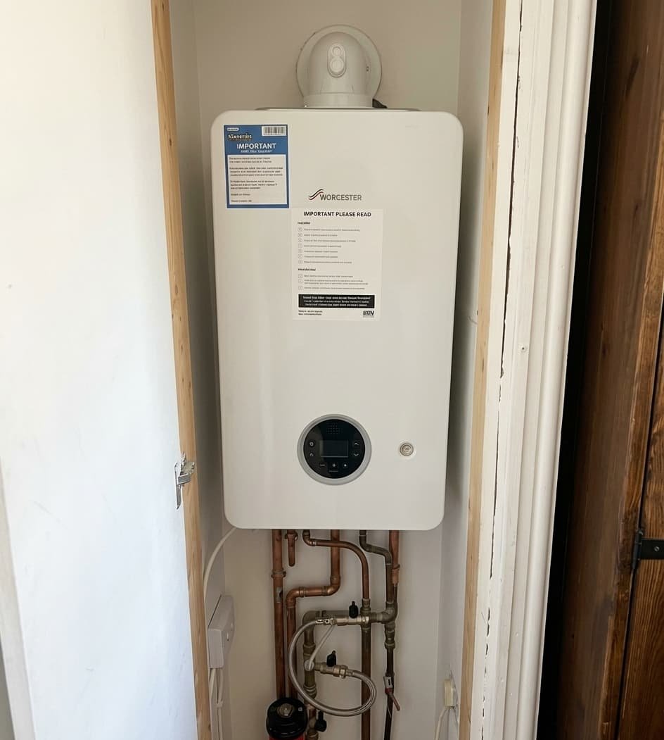 New gas boiler installation in a utility room