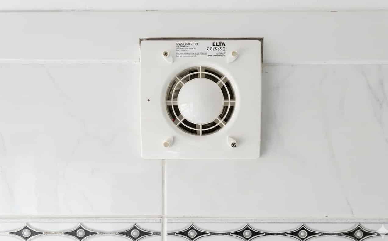 Ventilation case study, dMEV unit installed in a bathroom with neat cabling